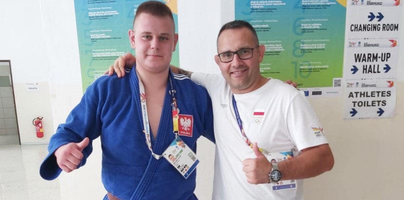Miłosz Kłos z trenerem Tomaszem Jopkiem